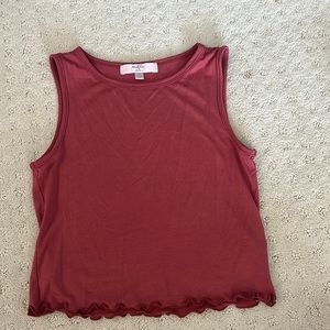 This is a cropped tank top size small in women’s. I have never worn.